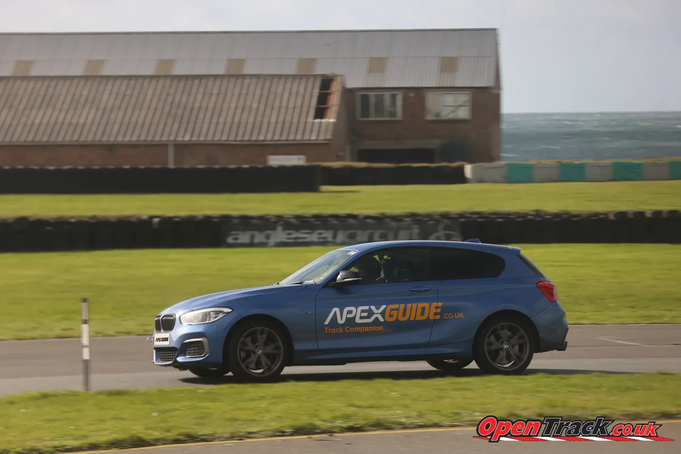The ApexGuide BMW passing the tyre wall at Anglesey Circuit