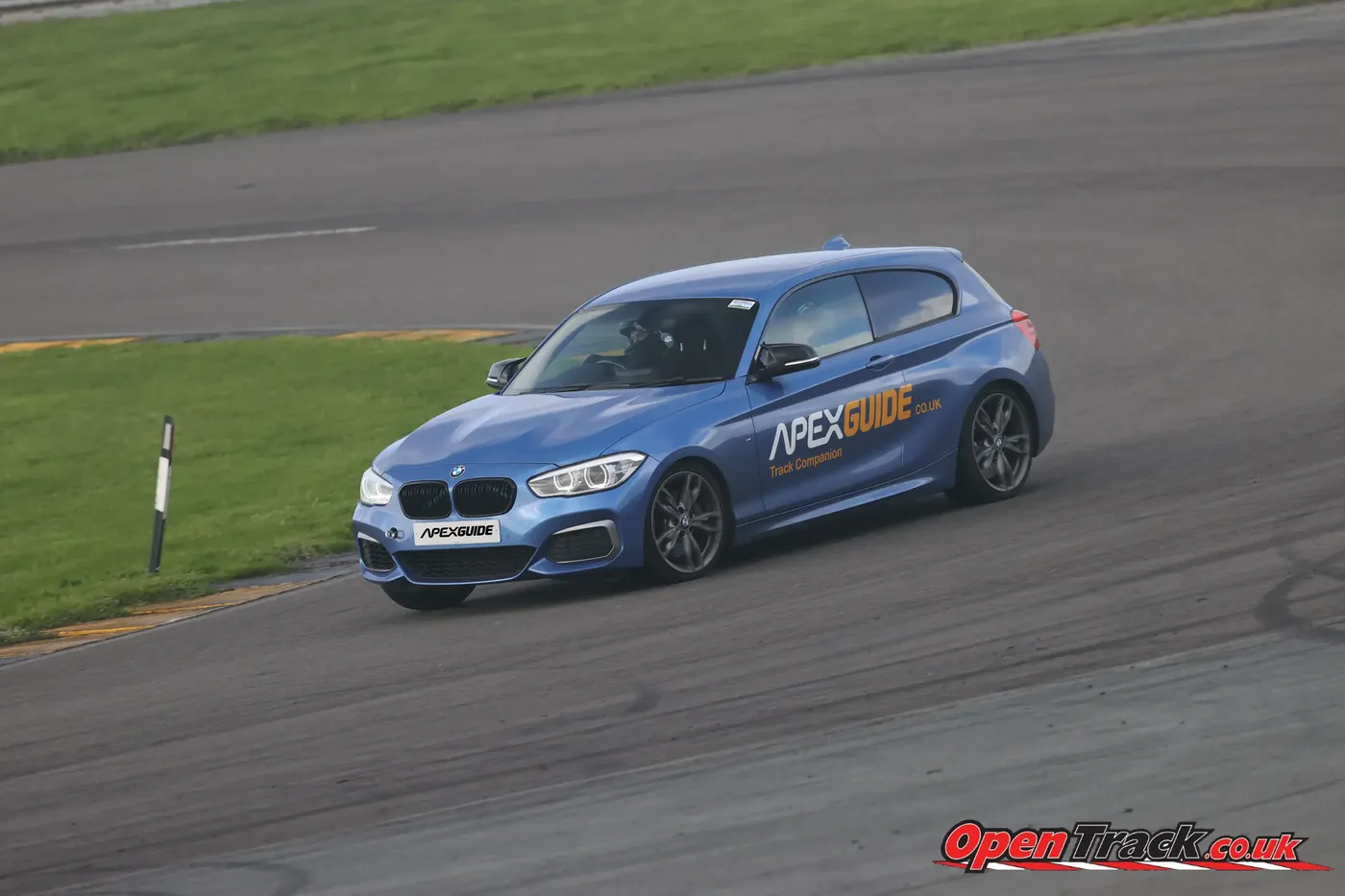 The ApexGuide BMW turning into a corner on a track day